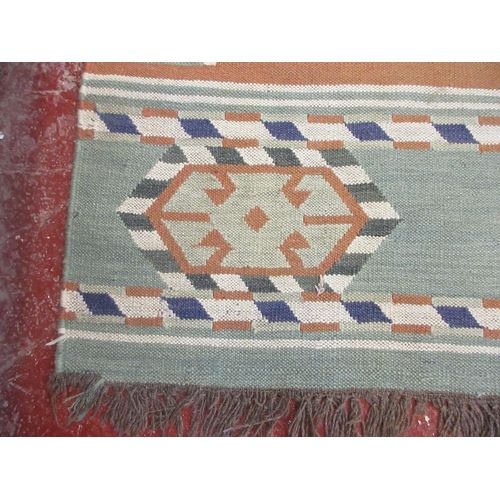 443 - Green patternend rug - Approx size 278cm x  186cm.