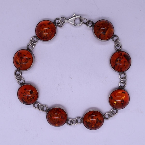 46 - 925 silver and amber bracelet with silver and amber ring.