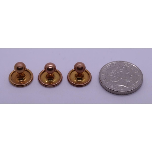 56 - Cased set of 3 9ct gold stud buttons