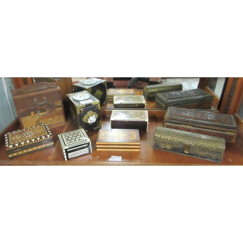 198 - Collection of carved, marquetry inlaid wooden jewellery and trinket boxes.