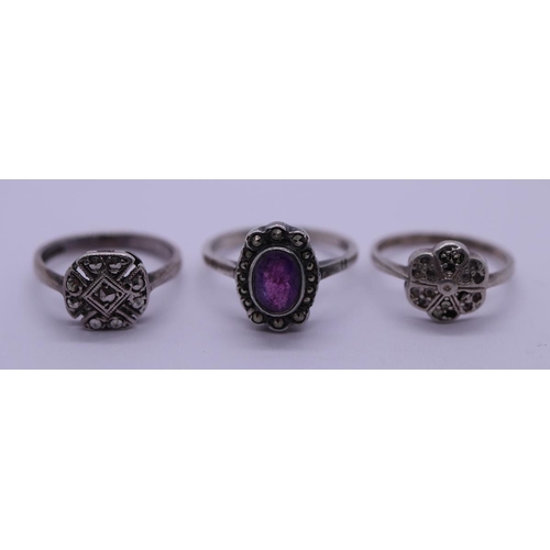 24 - Silver and amethyst ring with 2 other silver marcasite rings