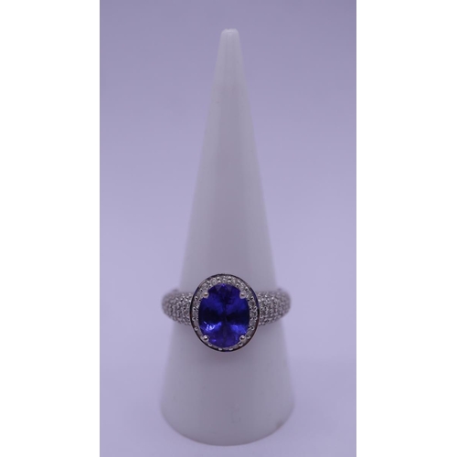 25 - 18ct white gold 3ct tanzanite & diamond set ring - Approx gross weight 6.5g - Size R