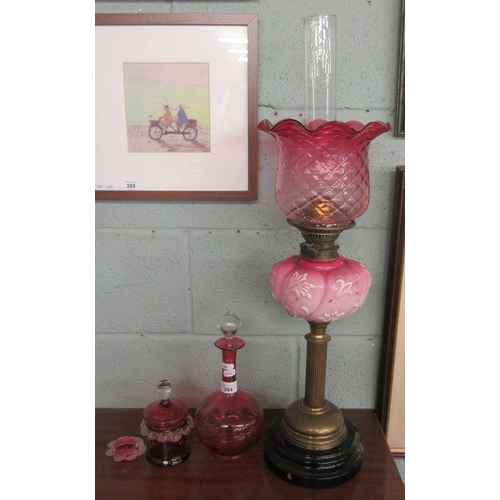 284 - Collection of cranberry glass together with an oil lamp - shade A/F