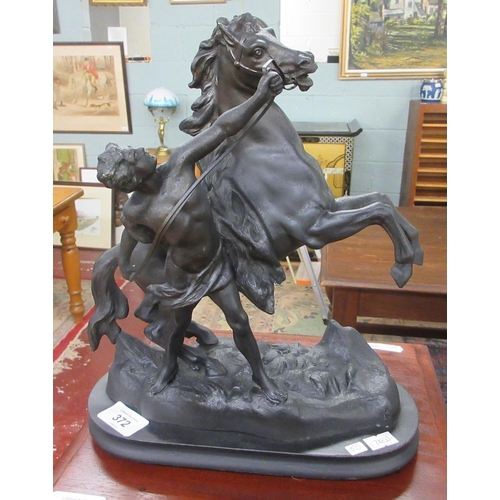 372 - Spelter figure of horse and handler in the style of Marly