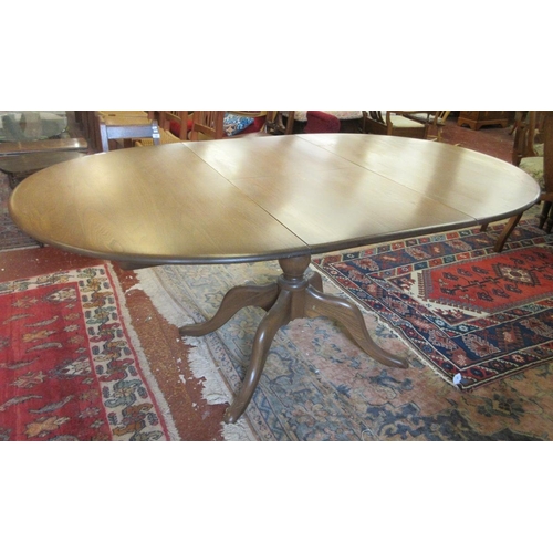 393 - Ercol golden dawn circular extending table - Approx size extended L: 182cm W: 109cm H: 74cm