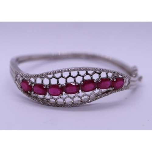 46 - Silver ruby set bangle