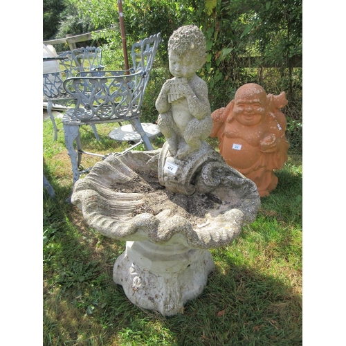 474 - Reconstituted stone birdbath with boy playing a pan flute