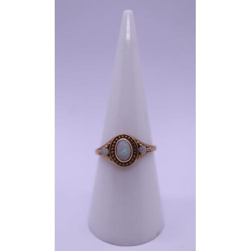 58 - 9ct gold opal set ring - Size N