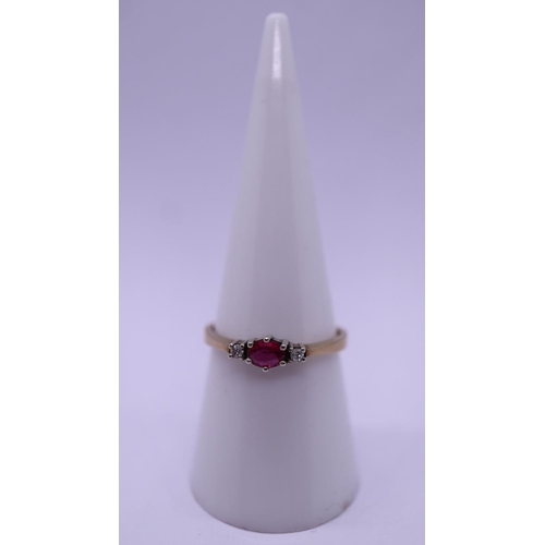 64 - 9ct gold ruby and diamond ring - Size O