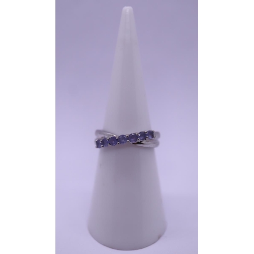 66 - White gold and tanzanite set ring - Size K