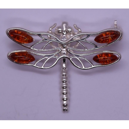 67 - Silver and amber dragonfly brooch