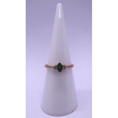 70 - 9ct gold diamond and emerald ring - Size L