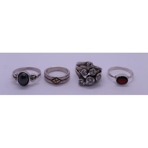 72 - 4 silver stone set rings