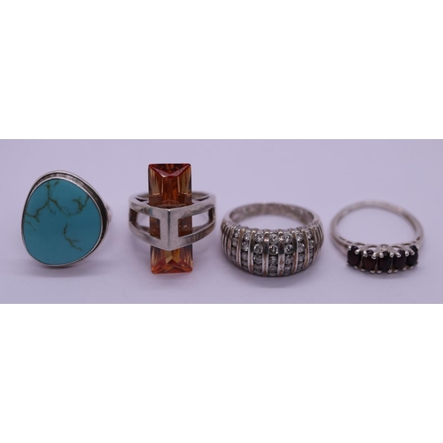 73 - 4 silver stone set rings