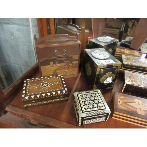 198 - Collection of carved, marquetry inlaid wooden jewellery and trinket boxes.