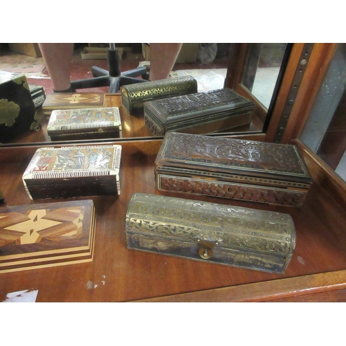 198 - Collection of carved, marquetry inlaid wooden jewellery and trinket boxes.