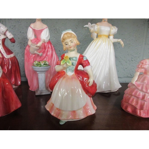 202 - Royal Doulton ladies figurines -- Kathleen, Alexandra, Rose, Lavinia, Valerie and 'Christmas Morn'. ... 