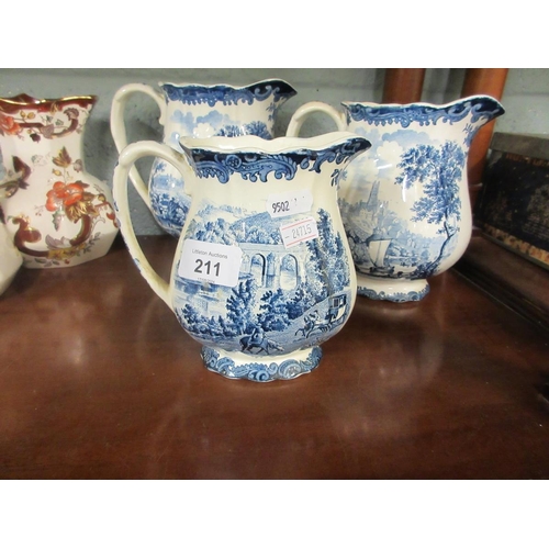 211 - 3 Mason's graduated jugs brown velvet together 3 Palissy Staffordshire blue and white graduated jugs