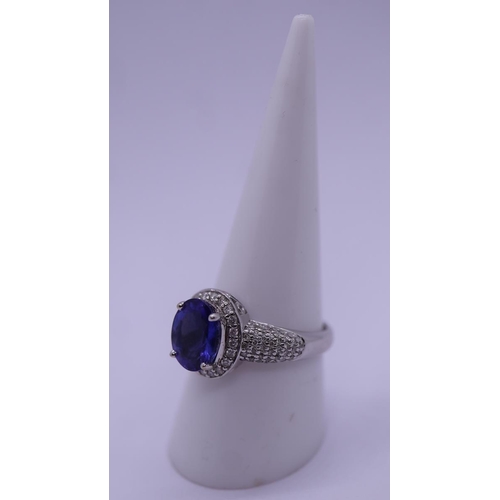 25 - 18ct white gold 3ct tanzanite & diamond set ring - Approx gross weight 6.5g - Size R