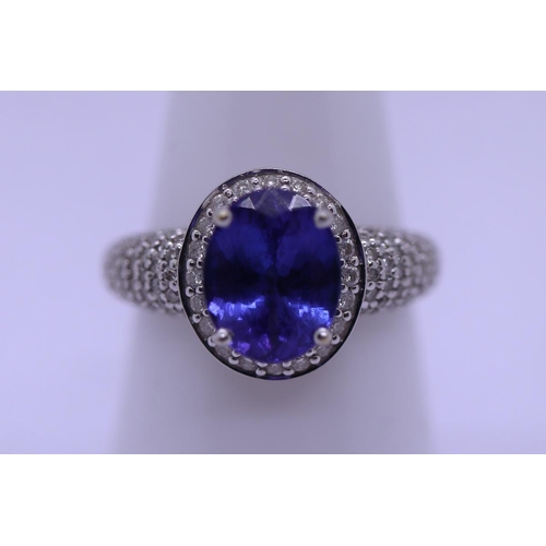 25 - 18ct white gold 3ct tanzanite & diamond set ring - Approx gross weight 6.5g - Size R