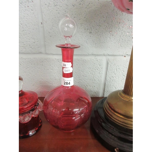 284 - Collection of cranberry glass together with an oil lamp - shade A/F