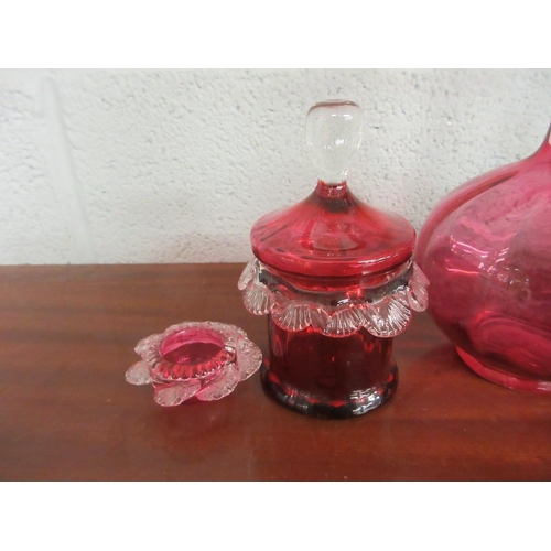 284 - Collection of cranberry glass together with an oil lamp - shade A/F