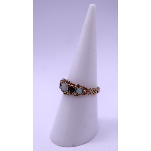 36 - 9ct gold opal and sapphire ring - Size L