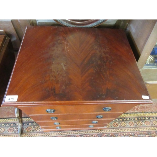 415 - Small mahogany chest of 4 drawers