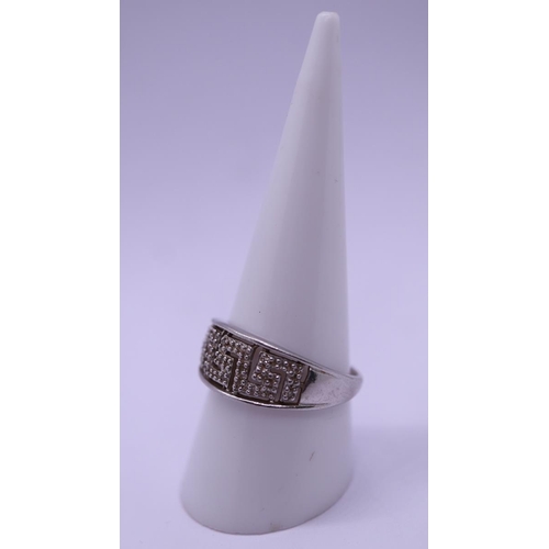 43 - White gold key pattern diamond set ring - Size S