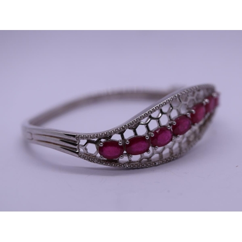 46 - Silver ruby set bangle