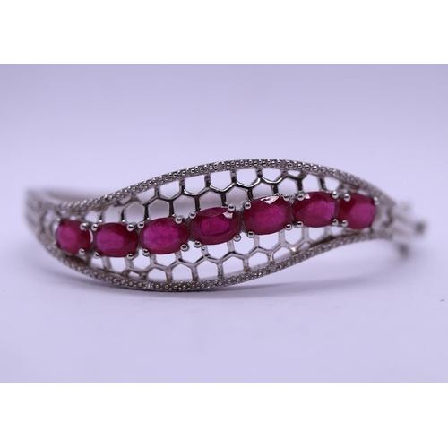 46 - Silver ruby set bangle