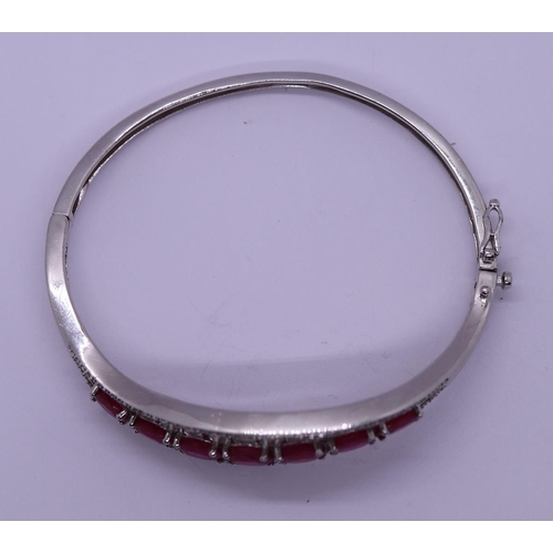 46 - Silver ruby set bangle