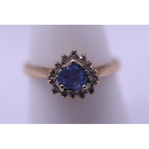 47 - 9ct gold sapphire and diamond ring - Size O