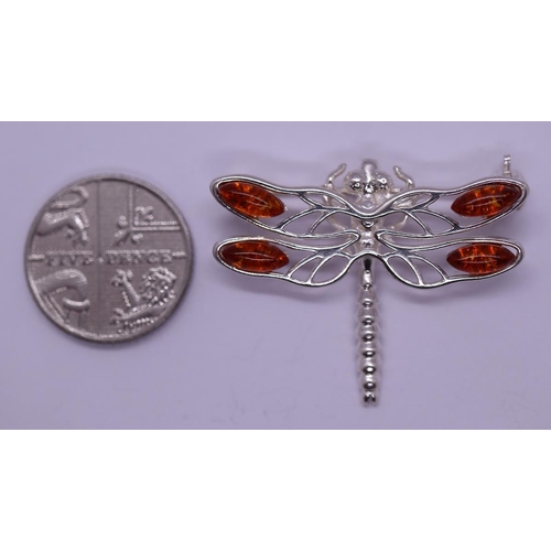 67 - Silver and amber dragonfly brooch