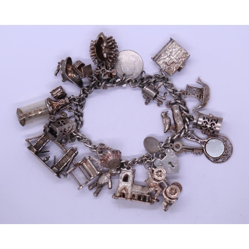 105 - Silver charm bracelet