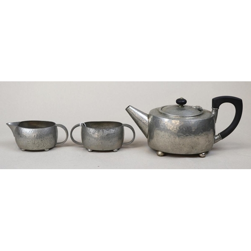 153 - Archibold Knox 3 piece Tuderic pewter tea service