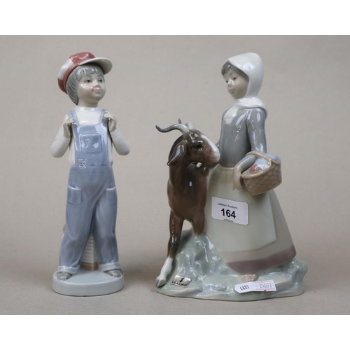 164 - 2 Lladro porceline figurines - 'Boy from Madrid' with accordion - approx height 21.5cm and 'Girl wit... 