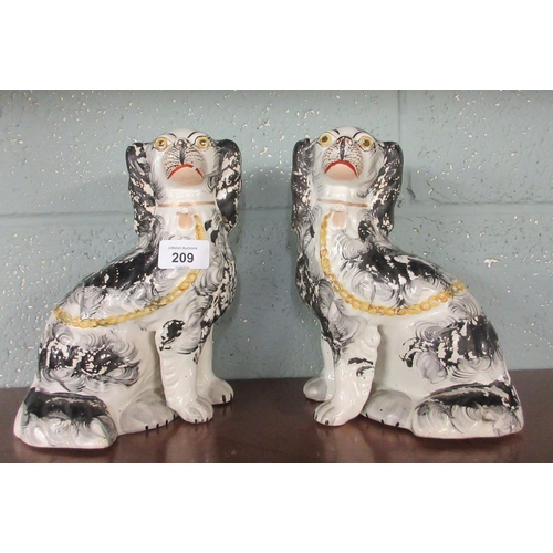 209 - Pair of Staffordshire dogs