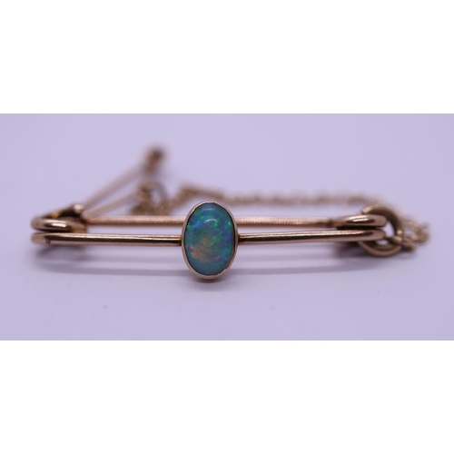 47 - 9ct gold opal set brooch