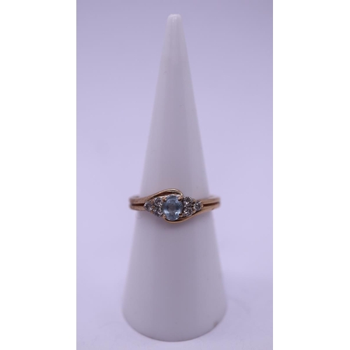 52 - 9ct gold aquamarine & diamond set ring - Size M