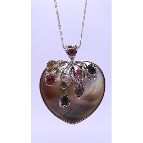 58 - Silver & abalone heart pendent set with precious stone