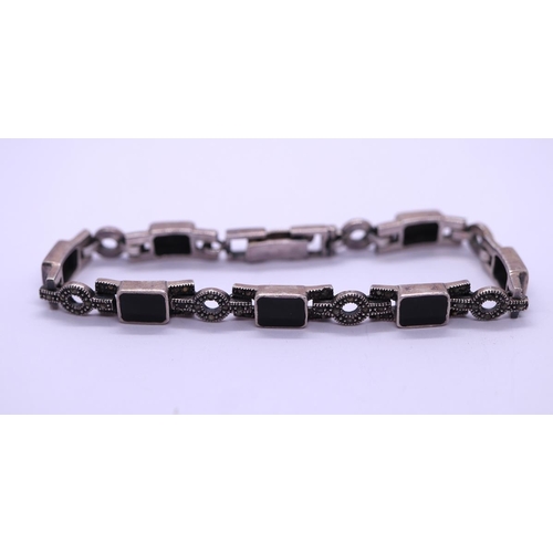 63 - Silver & onyx bracelet