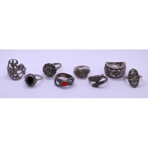 66 - 8 silver marcasite rings