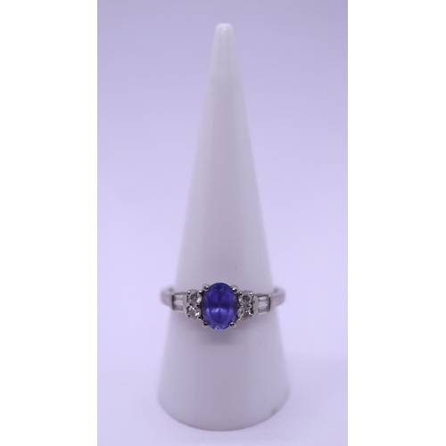 81 - Tanzanite and diamond platinum ring - Size R