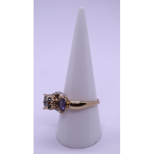 86 - 9ct gold amethyst, diamond and sapphire set ring in the form of a cat - Size R