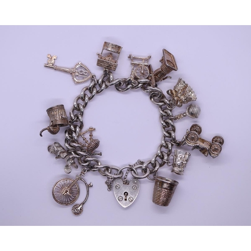 90 - Heavy silver charm bracelet - Approx weight 74.8g