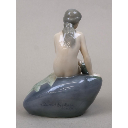 162 - Royal Copenhagen porceline figure of a Mermaid seated on a rock model no. 4431, moddelled and signed... 