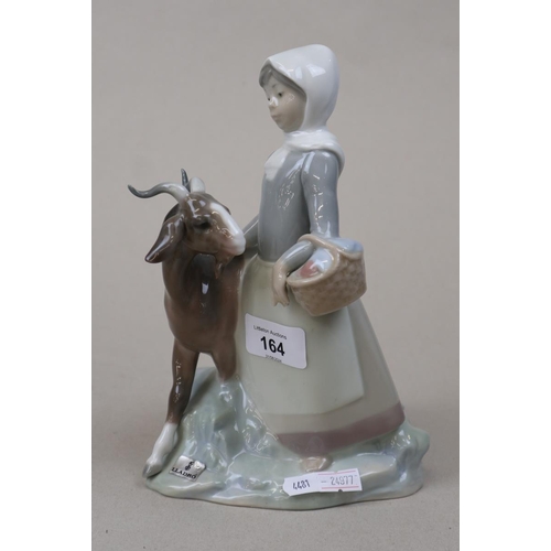 164 - 2 Lladro porceline figurines - 'Boy from Madrid' with accordion - approx height 21.5cm and 'Girl wit... 