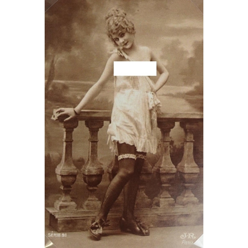 172 - A folder of 33 erotic French postcards