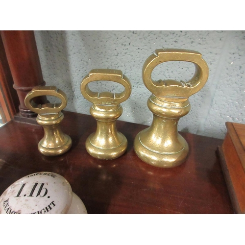 207 - Vintage brass scales in wooden box, with brass and enamel weights, plus enamel kitchen scales